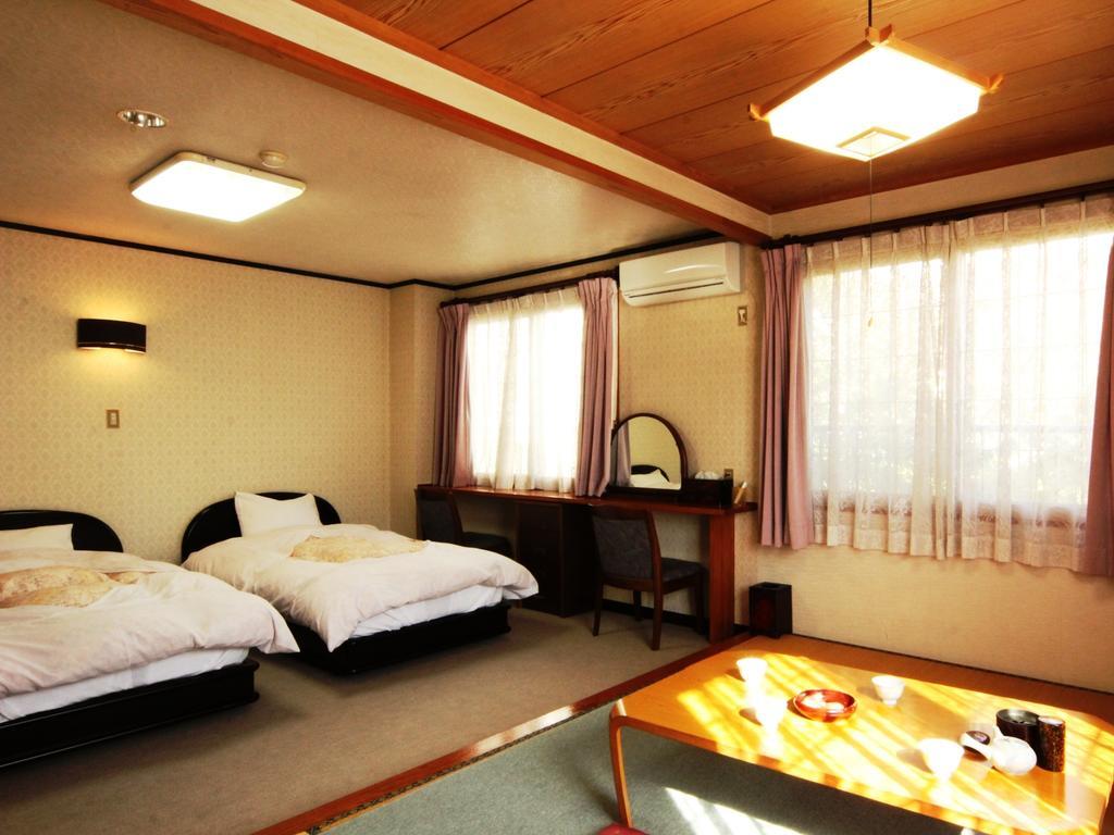 Ikemoto Hotel Nozawaonsen Buitenkant foto